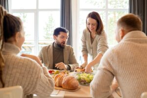 photo of woman wearing grey sweater